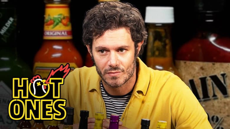 Adam Brody Surfs Through the Pain While Eating Spicy Wings