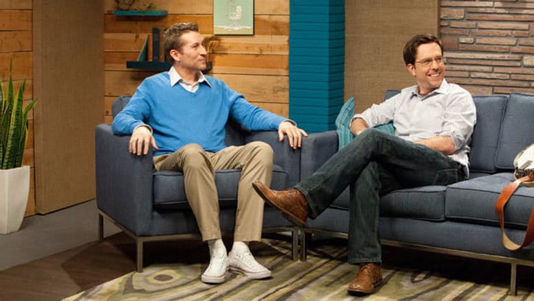 Ed Helms Wears a Grey Shirt & Brown Boots