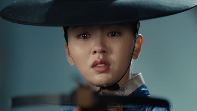 Dong-Ju Stands Before the King